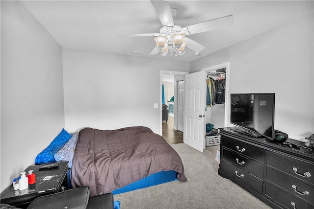 1435 Ashland Ave, Mt Zion, IL 62549 - carpeted bedroom featuring ceiling fan, a closet, and a spacious closet