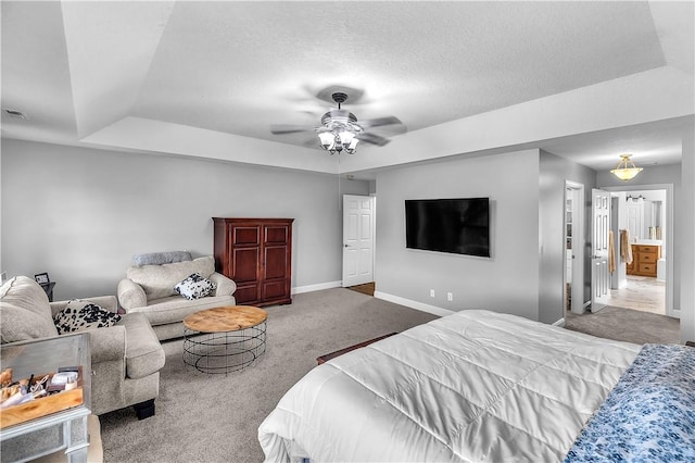 1435 Ashland Ave, Mt Zion, IL 62549 - bedroom with carpet floors, a raised ceiling, baseboards, and ceiling fan