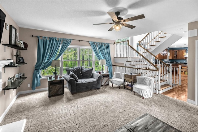 1435 Ashland Ave, Mt Zion, IL 62549 - living room with carpet flooring, stairs, ceiling fan, and baseboards