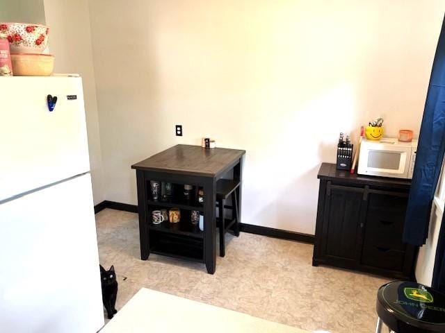 609 S 2nd St, Effingham, IL 62401 - dining room with baseboards and light flooring