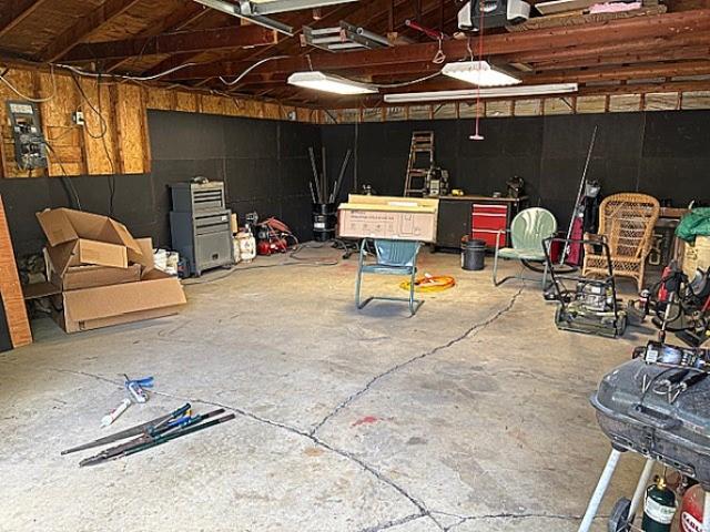 609 S 2nd St, Effingham, IL 62401 - garage featuring a garage door opener