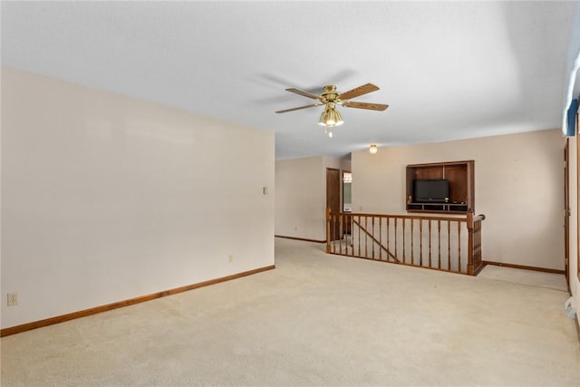2104 Sycamore St, Effingham, IL 62401 - unfurnished room with carpet floors and ceiling fan