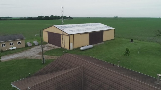 exterior space with an outbuilding and a rural view