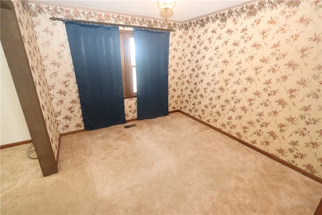 view of carpeted spare room