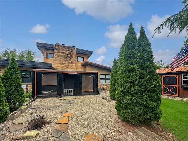 121 Charleston Ave, Mattoon, IL 61938 - rear view of property featuring an outdoor structure