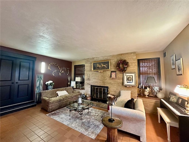 121 Charleston Ave, Mattoon, IL 61938 - living area featuring a large fireplace and a textured ceiling