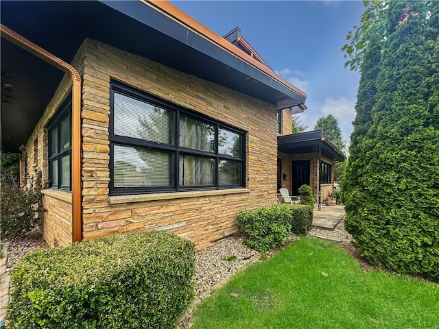 121 Charleston Ave, Mattoon, IL 61938 - view of property exterior with stone siding