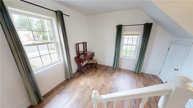 112 N 3rd St, Hoopeston, IL 60942 - living area featuring healthy amount of natural light, light wood-type flooring, and baseboards