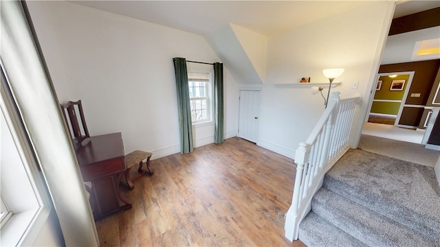 112 N 3rd St, Hoopeston, IL 60942 - entryway with wood finished floors, baseboards, and vaulted ceiling