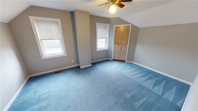 112 N 3rd St, Hoopeston, IL 60942 - bonus room featuring a ceiling fan, carpet flooring, vaulted ceiling, and baseboards