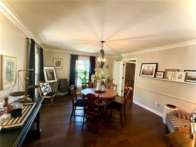 141 Hightide Dr, Decatur, IL 62521 - dining area with crown molding, a chandelier, dark wood-style flooring, and baseboards
