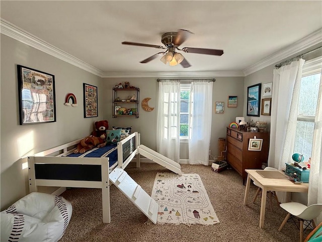 141 Hightide Dr, Decatur, IL 62521 - carpeted bedroom featuring crown molding, multiple windows, ceiling fan, and baseboards