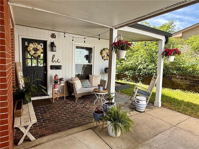 141 Hightide Dr, Decatur, IL 62521 - view of patio / terrace with a porch