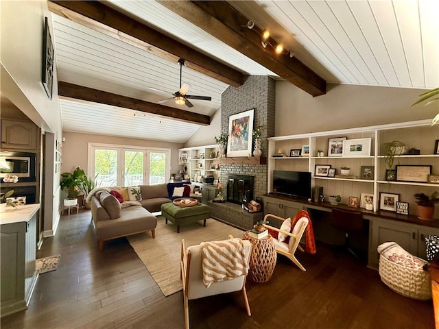 141 Hightide Dr, Decatur, IL 62521 - living area with a ceiling fan, a fireplace, and dark wood-type flooring