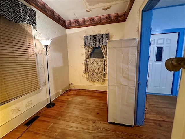 interior space with hardwood / wood-style flooring