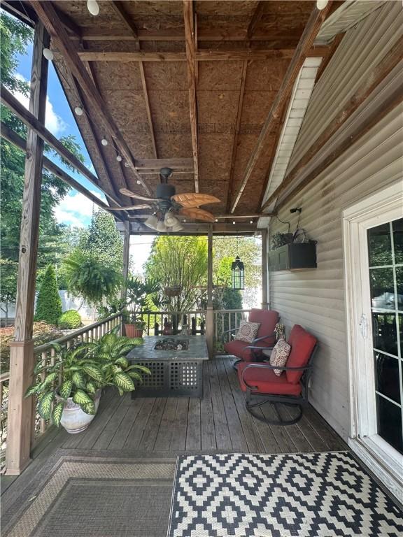 808 Moultrie Ave, Mattoon, IL 61938 - wooden terrace with a ceiling fan