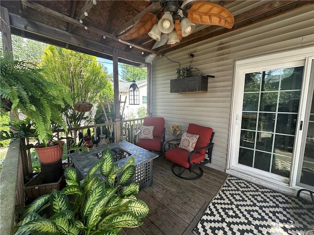 808 Moultrie Ave, Mattoon, IL 61938 - deck with an outdoor fire pit and a ceiling fan