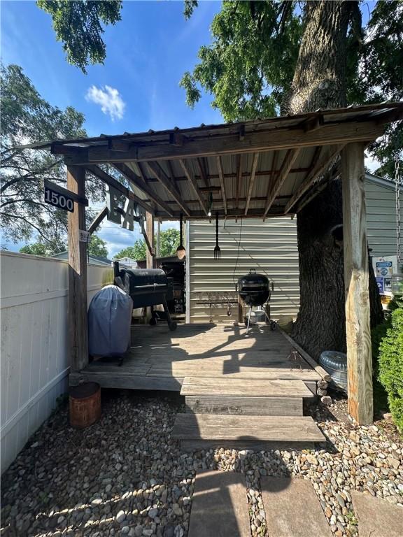 808 Moultrie Ave, Mattoon, IL 61938 - view of patio featuring a deck and grilling area