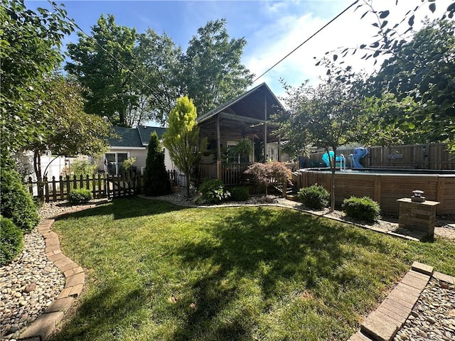 808 Moultrie Ave, Mattoon, IL 61938 - fenced yard with a pool