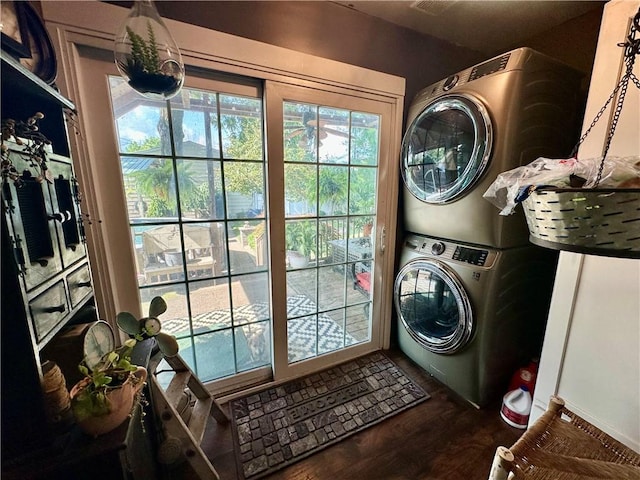 808 Moultrie Ave, Mattoon, IL 61938 - laundry room featuring stacked washer / drying machine and dark wood finished floors