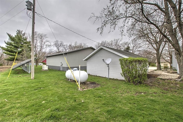 view of property exterior featuring a lawn