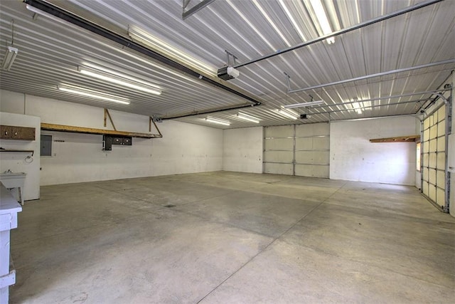 garage with metal wall and electric panel