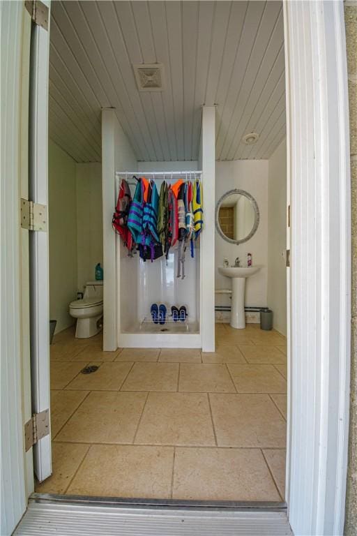 2928 Lakewood Dr, Vandalia, IL 62471 - full bathroom with wooden ceiling, a bidet, and tile patterned floors