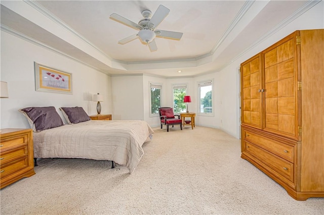 2928 Lakewood Dr, Vandalia, IL 62471 - bedroom with crown molding, a tray ceiling, light carpet, and a ceiling fan