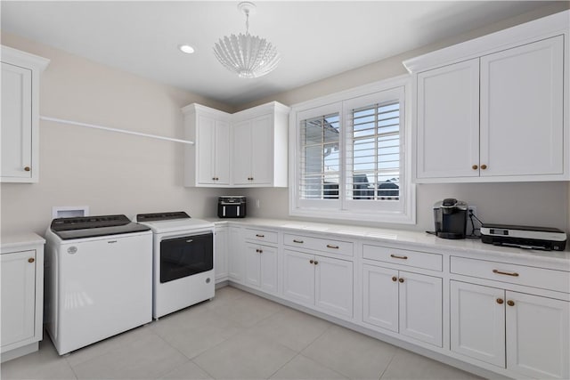 clothes washing area with recessed lighting, cabinet space, independent washer and dryer, and light tile patterned floors