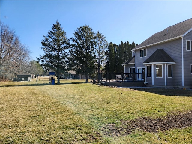 view of yard featuring a deck