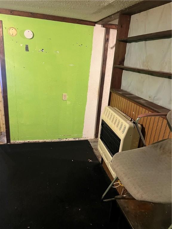 702 W Mulberry St, Robinson, IL 62454 - interior space with heating unit