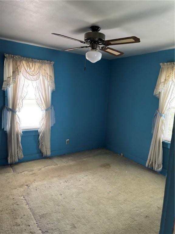 106 W Wernsing Ave, Effingham, IL 62401 - carpeted spare room with plenty of natural light and a ceiling fan