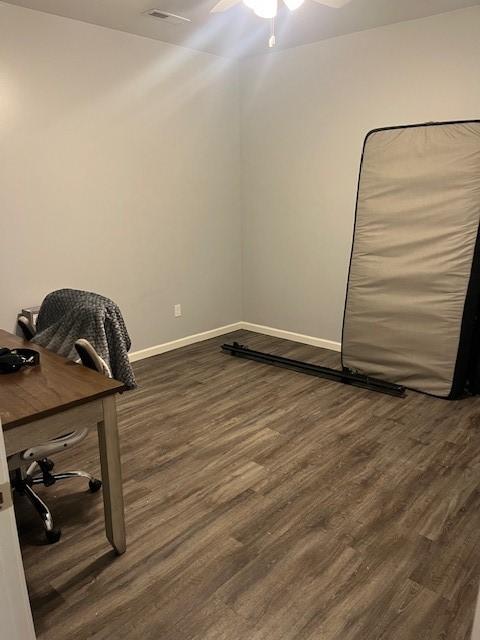 609 W Clinton Ave, Effingham, IL 62401 - unfurnished office featuring dark wood-style flooring and a ceiling fan
