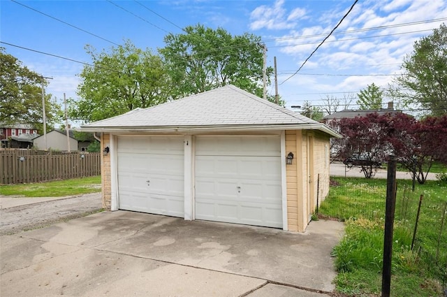 detached garage with fence