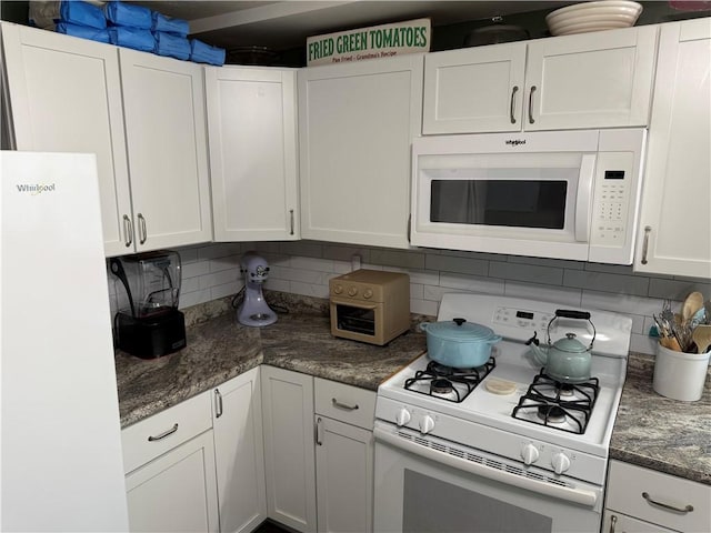 509 E Gordon Ave, Effingham, IL 62401 - kitchen featuring white appliances, backsplash, white cabinetry, and dark stone countertops