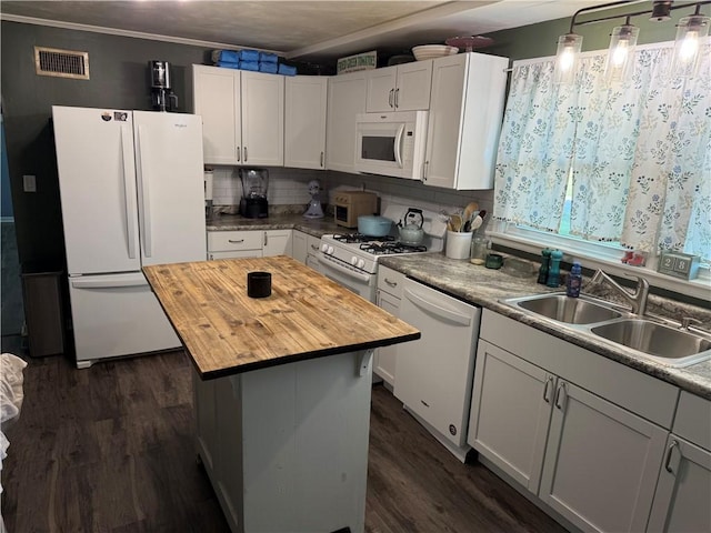 509 E Gordon Ave, Effingham, IL 62401 - kitchen with white appliances, butcher block countertops, dark wood-type flooring, white cabinets, and backsplash