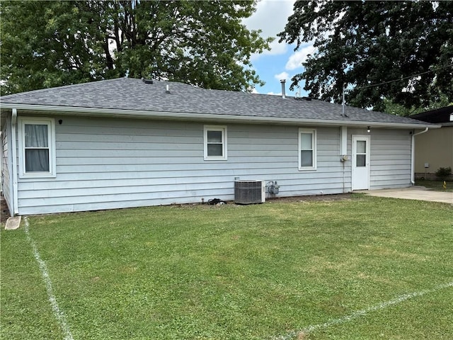 509 E Gordon Ave, Effingham, IL 62401 - back of house with a yard, roof with shingles, and a patio area