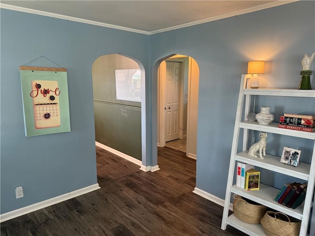 509 E Gordon Ave, Effingham, IL 62401 - unfurnished room with wood finished floors, arched walkways, and ornamental molding