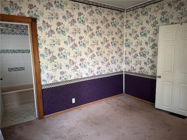 1524 Adams Ave, Charleston, IL 61920 - carpeted empty room with wallpapered walls