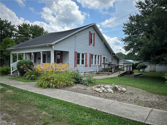 1524 Adams Ave, Charleston, IL 61920 - view of front of house with covered porch and a front yard