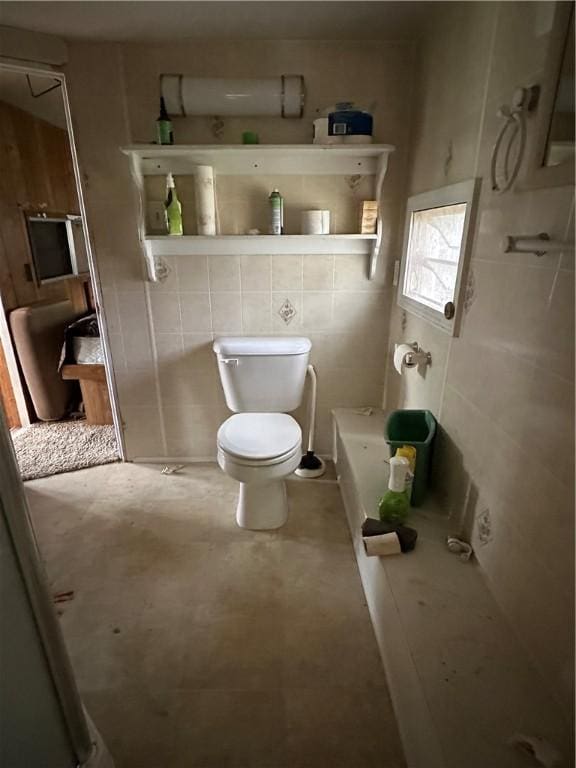 221 Celebration Ct, Oakwood, IL 61858 - full bathroom with a bathtub, tile walls, and concrete floors