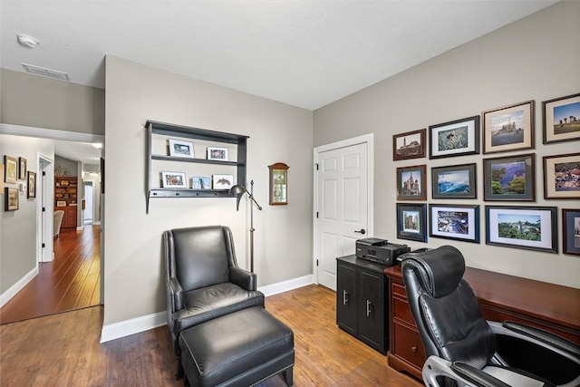 707 W Coolidge Ave, Charleston, IL 61920 - office featuring wood finished floors and baseboards