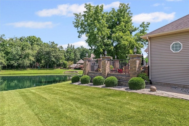 707 W Coolidge Ave, Charleston, IL 61920 - view of green lawn featuring a water view