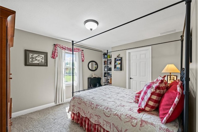 707 W Coolidge Ave, Charleston, IL 61920 - bedroom featuring carpet flooring and baseboards