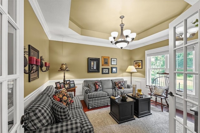 707 W Coolidge Ave, Charleston, IL 61920 - office with a chandelier, crown molding, a wainscoted wall, a tray ceiling, and light wood-style floors