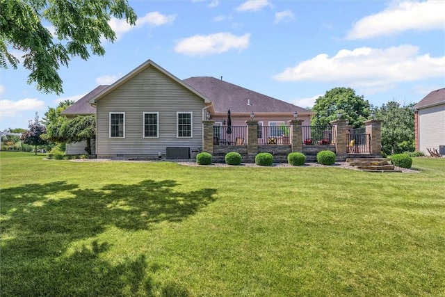 707 W Coolidge Ave, Charleston, IL 61920 - rear view of property featuring a yard