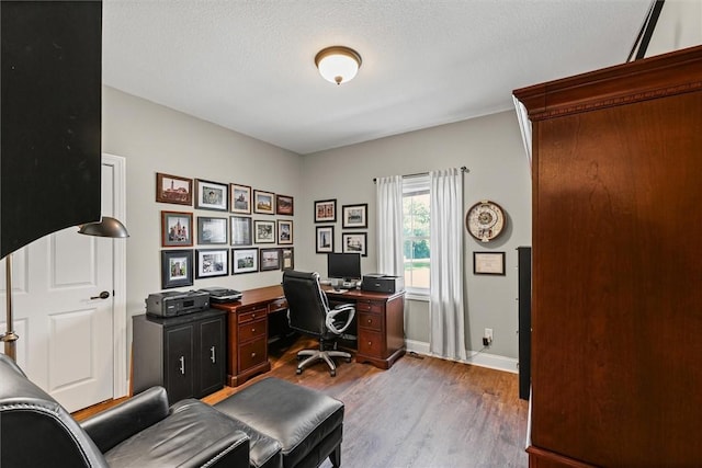 707 W Coolidge Ave, Charleston, IL 61920 - office featuring wood finished floors and baseboards