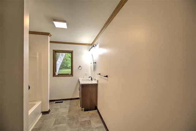 5959 Heritage Ln, Oakley, IL 62501 - bathroom with crown molding, baseboards, vanity, and tub / shower combination