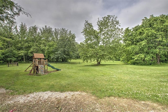 5959 Heritage Ln, Oakley, IL 62501 - view of yard featuring a playground