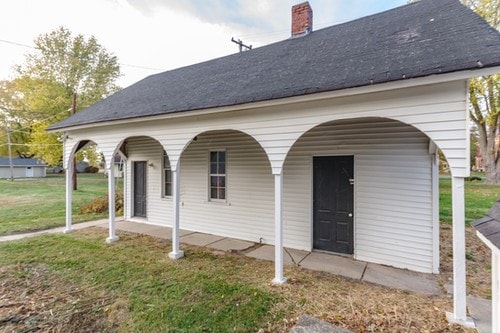 exterior space with a yard